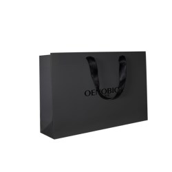 black cardboard with spot UV logo ribbon handle